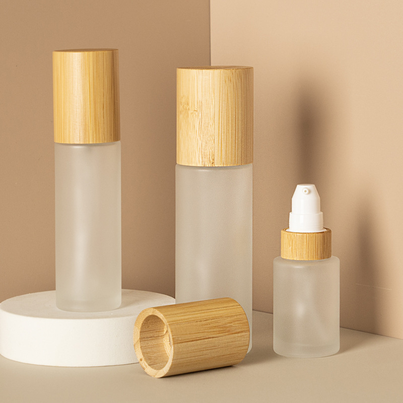 Frosted Kosmetisk Lotion Pump Fin Mist Og Lotion Glas Sprayflaske Med Bambus Træ Låg