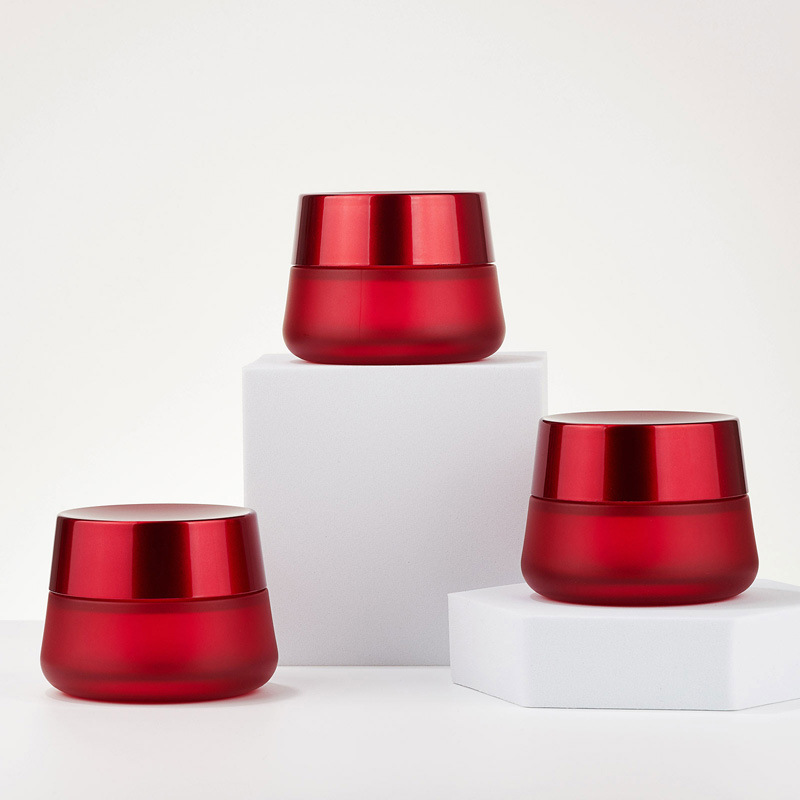 Rund kosmetisk rød cremekrukke Tom glasflødekrukke
