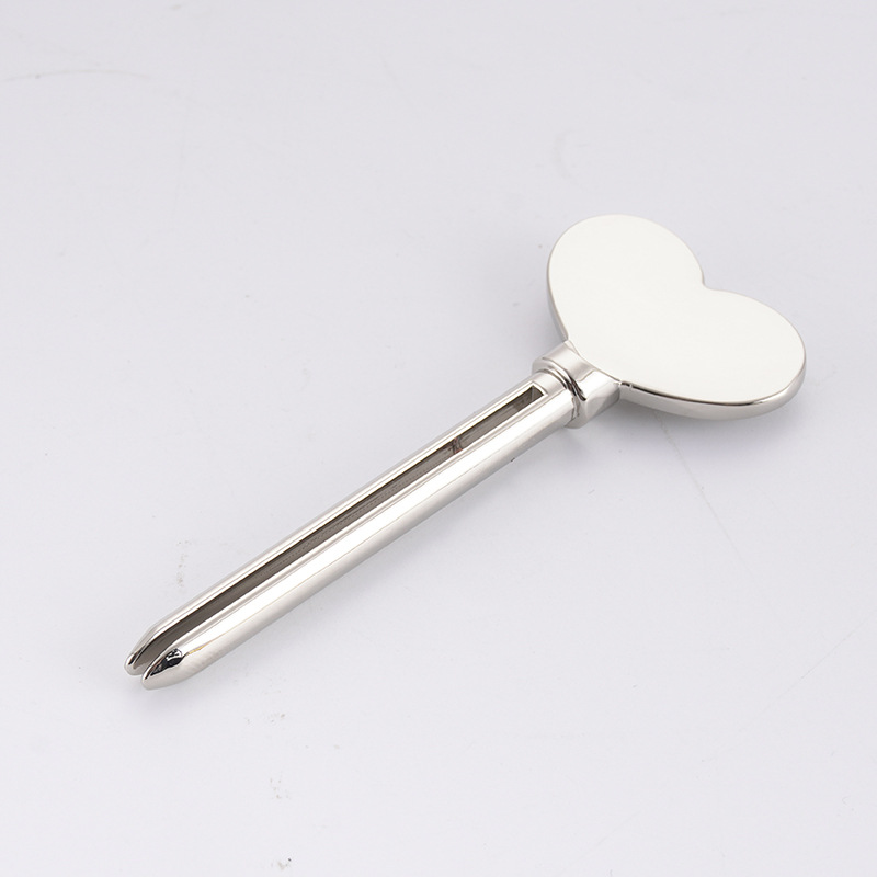 Metal Tandpasta Dispenser Ansigtsrens Tandpasta Tube Squeezer Nøgleform Kosmetik Tube Squeezer
