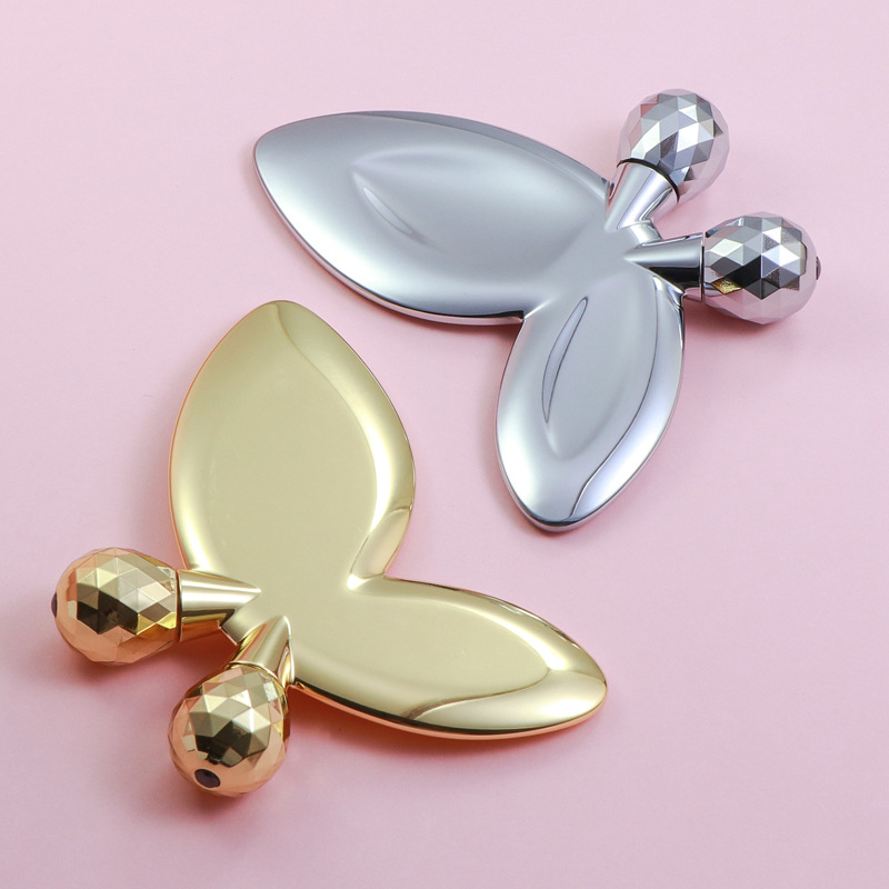 Zinklegering sommerfugleformet ansigtsmassagerulle