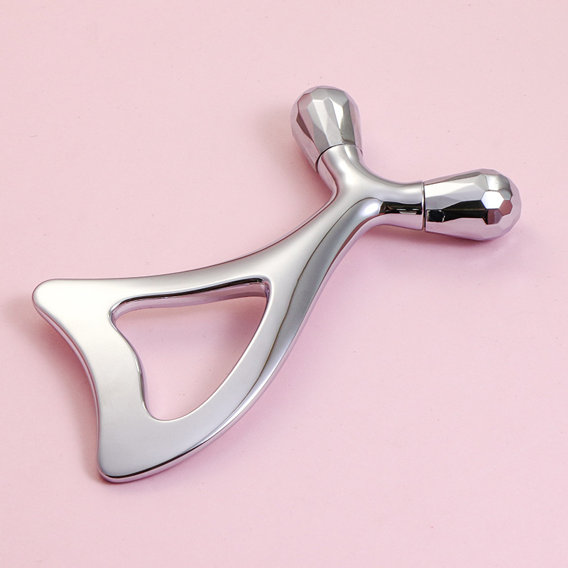 Zinklegering øjenmassagerulle og ansigts-Gua Sha-værktøj Zinklegering øjenmassagerulle og ansigts-Gua Sha-værktøj